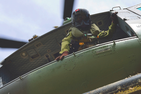 A Royal Canadian Air Force CH-146 Griffon helicopter takes off.